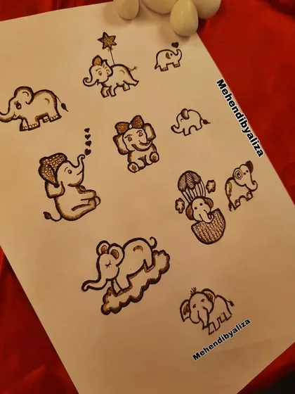 A canvas filled with cute little elephants in various poses. This is a great inspiration for baby shower themes or for anyone who loves elephants.