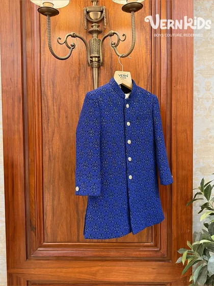 Our royal blue Jodhpuri jacket is a classic that never goes out of style. The rich fabric and sharp tailoring make it a versatile piece for any celebration, ensuring your little one looks his best.