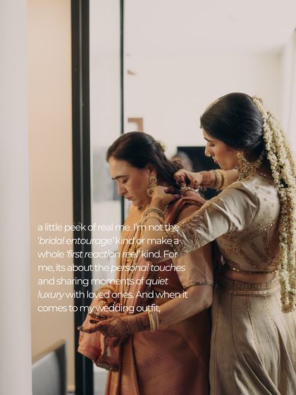A bride helping her mother with her jewelry. This image highlights the importance of practicality in bridal looks, a conversation we always have with our clients to ensure they are comfortable and can enjoy these precious moments.