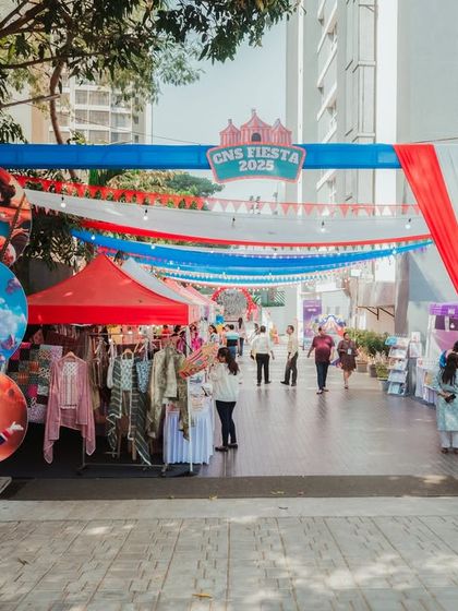 Another view of the CNS Fiesta entrance, showing how we use colorful drapes and banners to create a festive pathway, guiding guests through the different zones of the event.