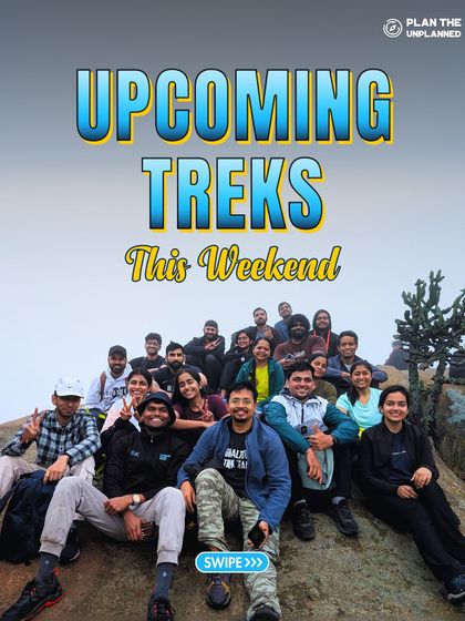 A happy group of trekkers sitting together on a rocky outcrop. Find your tribe and your next adventure in our list of upcoming weekend treks.