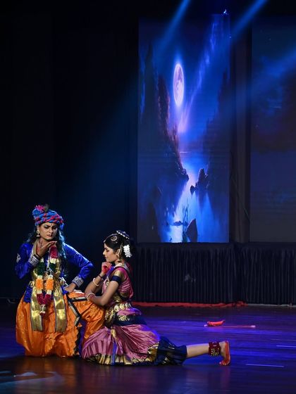 The expressive storytelling continues between Krishna and Gopika against a magical, moonlit backdrop.