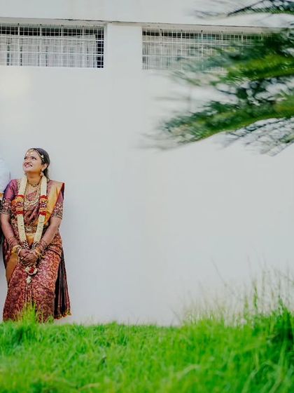 A minimalist couple portrait using negative space to draw full attention to the bride and groom, capturing a serene moment of togetherness.