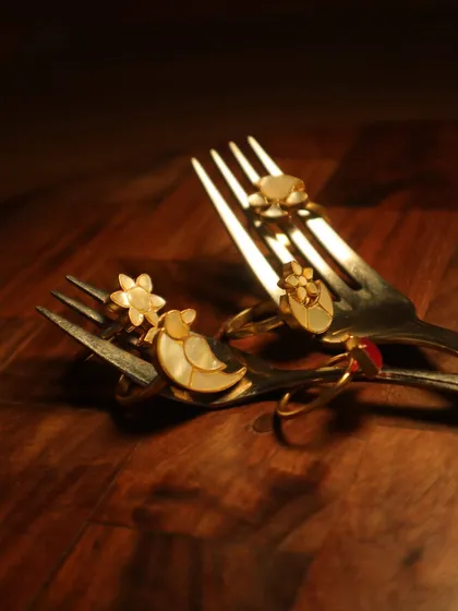 My nature-inspired adjustable rings, displayed playfully on forks. Each one is a piece of wearable art, perfect for everyday luxury.