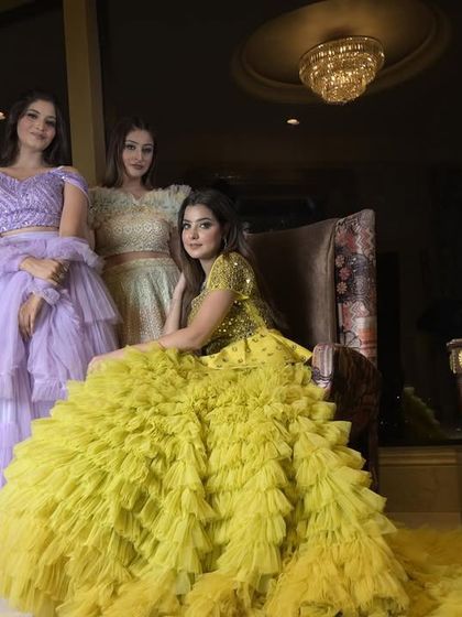 Another group shot of the ruffle gown collection. The different colors and styles demonstrate the variety available for clients looking for a fun, high-fashion, and textured look.