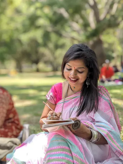 This is me in my happy place, painting under the trees at Cubbon Park. There's nothing quite like creating art outdoors, and I love sharing this feeling with everyone who joins.