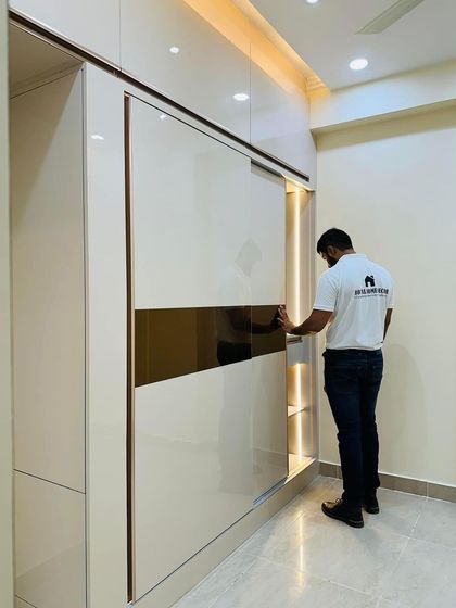 A close-up of the sliding wardrobe mechanism, showcasing the smooth operation and high-quality finish.