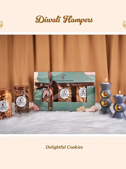 Our delightful cookies are a wonderful addition to any Diwali celebration. This gift set includes jars of our crunchy, flavorful cookies alongside a smaller assorted cookie box, paired with decorative candles.