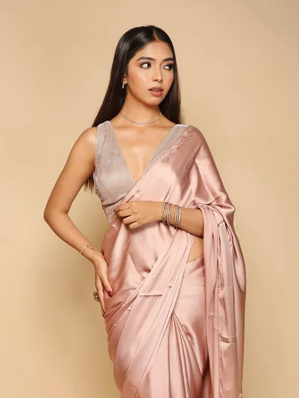 Another pose from the same saree shoot, highlighting the fabric's drape and texture. We ensure consistent lighting for catalogue and lookbook photography.