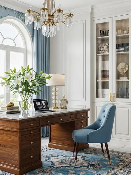 A classic and elegant home office concept with a traditional wooden desk, blue accents, and beautiful floral wallpaper.