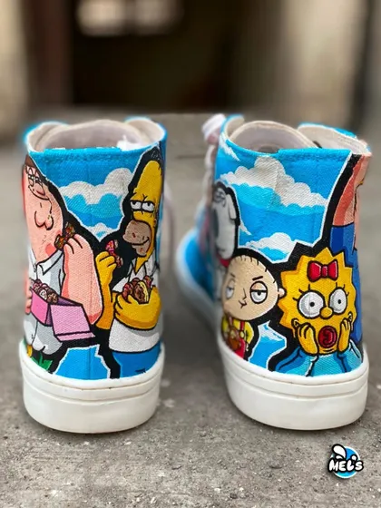 The back view of the cartoon mashup sneakers, showing Peter Griffin and Homer Simpson next to Maggie and Stewie.