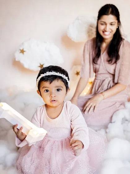 A dreamy "above the clouds" theme for a first birthday shoot. I love working with parents to design and create custom setups at home that perfectly match their baby's name or personality.