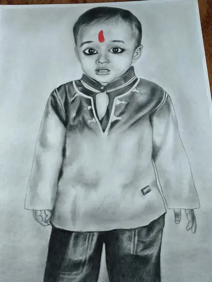 A commissioned portrait of a young boy in a traditional kurta, with the red bindi providing a striking pop of color.