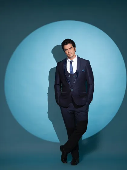 I styled the charming Gashmeer Mahajani for a commercial shoot in this sharp, three-piece navy suit. The focus was on a clean, modern, and powerful silhouette that exudes confidence and class.