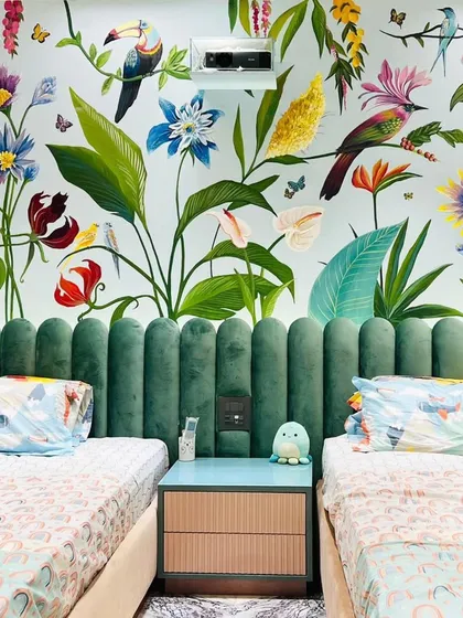 This summery tropical mural was a massive project that I'm so proud of. I used matte acrylics to bring this vibrant scene to life in a kids' bedroom, turning the entire wall into a piece of art.