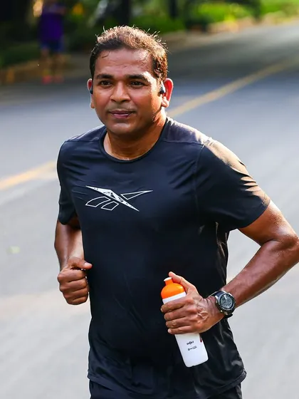 An athlete staying hydrated during a tough interval session. Smart training includes proper hydration strategy.