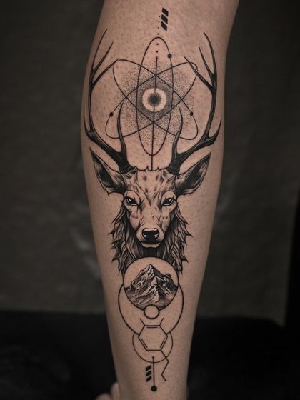 This tattoo combines a realistic deer portrait with sharp geometric elements and scientific symbols. It's a perfect example of how we can merge different styles to create a unique and personal piece.