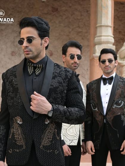 A close-up of the trio, highlighting the different textures and embellishments, from the leopard embroidery to the abstract line work.