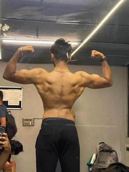 Another progress picture from our locker room. The back and shoulder definition here is a direct result of disciplined training.