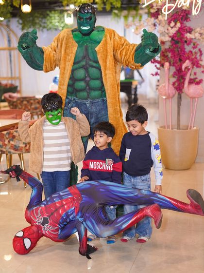 The birthday boy and his friends having a blast with the Hulk and Spider-Man mascots. We provide entertainment that is both interactive and exciting for the kids.