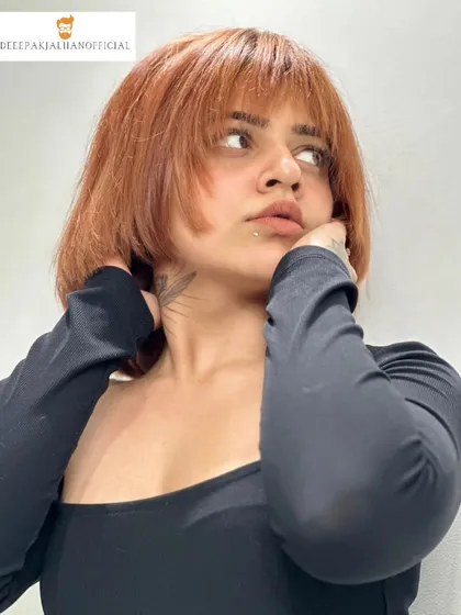 A hairstyle can be a statement. This edgy copper brown bob with textured bangs isn't just a color and cut; it's a complete vibe, designed to frame the face and radiate confidence.
