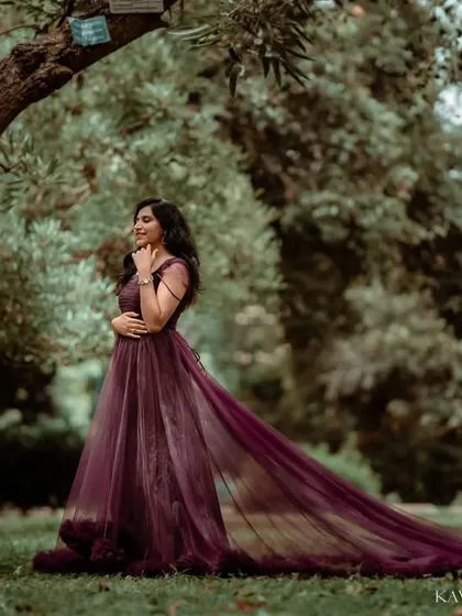 For the mom-to-be who wants to feel like a queen for a day. This outdoor maternity portrait uses a beautiful, flowing gown and the soft light of a park setting to create an elegant and romantic image that celebrates motherhood.