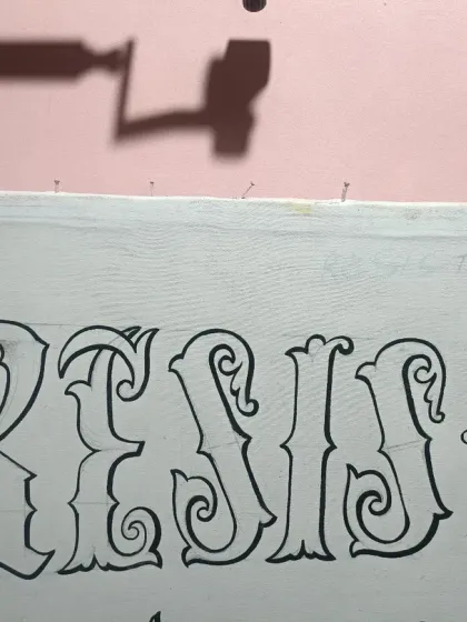 The outline for the word "RESIST" is complete.
