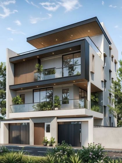 Our latest contemporary project in JP Nagar, designed for a client who wanted spacious rooms overlooking green spaces. The facade features clean lines, large balconies with glass railings, and a prominent framed volume.