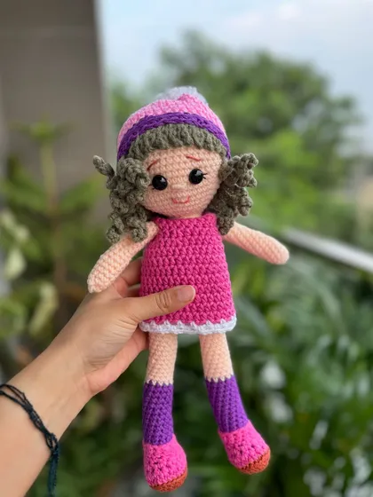Our Patsy doll is ready for adventure in her pink dress and matching hat. She's a perfect first doll for any child.