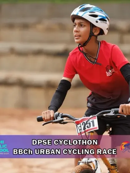 A young female rider shows her determination on the course. I am committed to encouraging more girls to participate and excel in the sport of cycling.