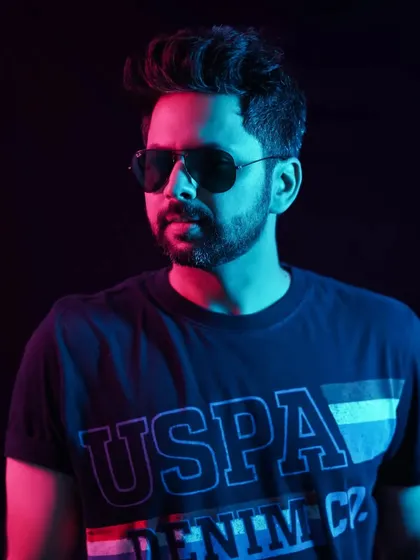 A moody portrait with some cool red and blue lighting. It's been a while, but I'm back and ready to party all weekend.