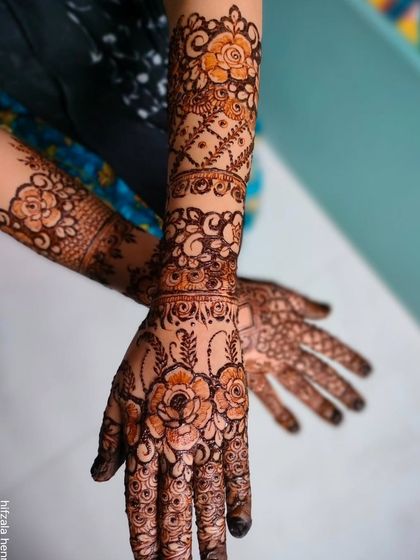 A beautiful floral design from my Eid collection, with intricate bands and roses covering the hands and arms.