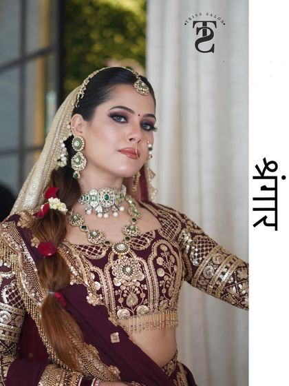 This shot showcases the complete bridal profile, including the hair, jewelry, and makeup. I work to ensure all elements are in harmony for a truly unforgettable wedding day look.