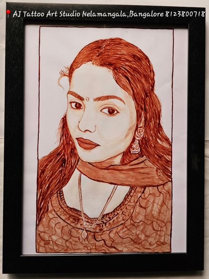 This close-up portrait of a woman, painted in blood, is rich in detail and expression. The artwork is a beautiful example of a solo commission, framed and ready to be cherished.