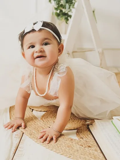 Crawling towards a new adventure. This shot captures the movement and curiosity of a one-year-old perfectly.