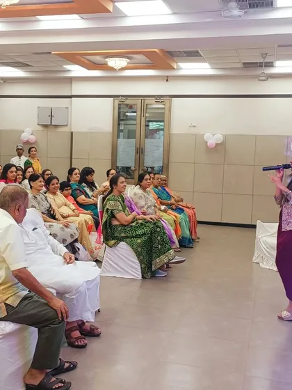 Addressing the guests at a welcome baby celebration. I love sharing stories and creating a narrative that connects everyone in the room to the happy occasion.