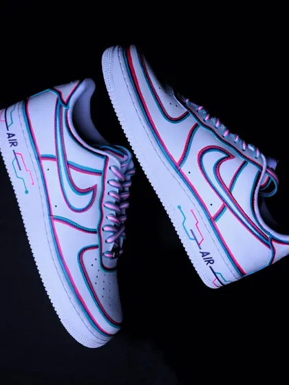 These "Wired" custom Air Force 1s are inspired by a cyberpunk color palette. It's a minimal design with a 3D glitch effect that's super clean and futuristic.
