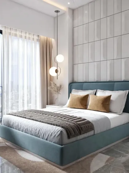 A modern bedroom design with a cool blue upholstered bed and a striking 3D tiled accent wall. The combination of textures and the clean color palette creates a fresh and contemporary look.