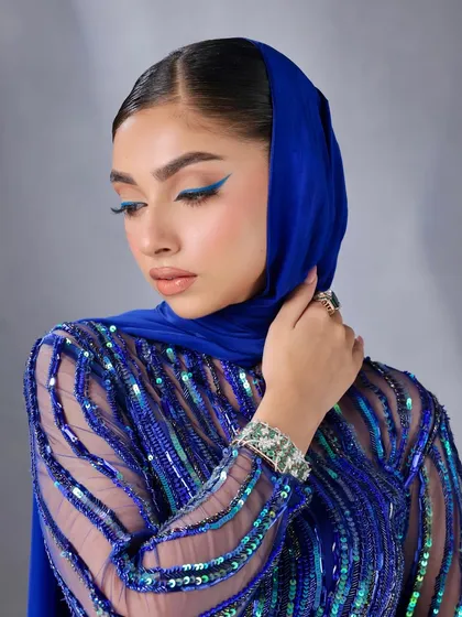 Another angle of the electric blue vibe. The liner is the star of the show, perfectly executed for maximum impact.