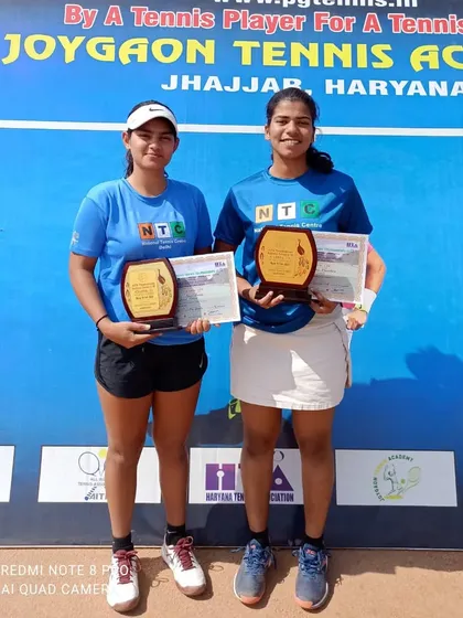 Our U-18 girls' pair, Apara Khandare and Navy Dabas, celebrating their doubles victory at the AITA Girls U-18 National Series.