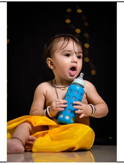 A candid and funny moment from a studio shoot. These unscripted moments often become the family's favorite pictures.