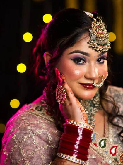 The rich colors of the makeup pop against the soft lighting. Our students learn about lighting to ensure their makeup looks great in any setting.
