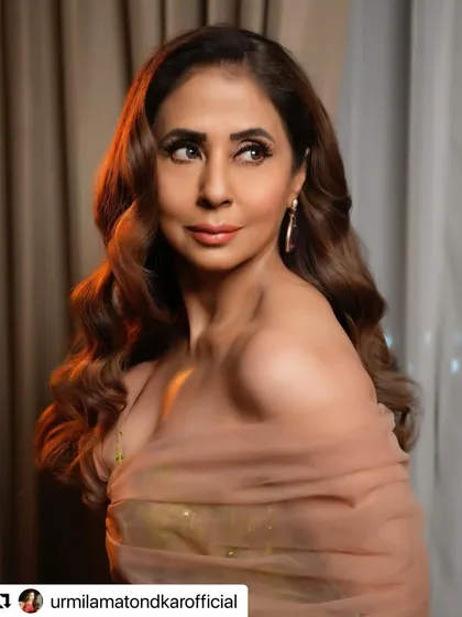 Crafting a complete look with a new haircut and color for the amazing Urmila Matondkar. The soft, voluminous curls add a touch of old-school glamour that is simply breathtaking.