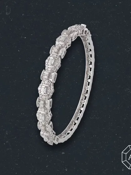Shine like the diamond you are. This elegant tennis-style bracelet features alternating clusters of round and baguette diamonds, making it a statement of timeless brilliance.