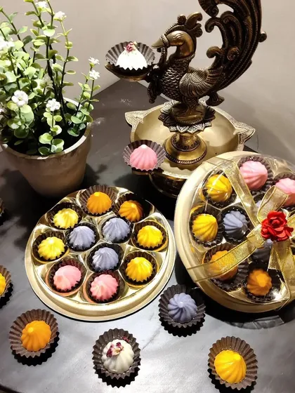 My chocolate modaks are available in boxes of 11, making them easy to gift and distribute. The packaging is designed to be elegant and festive, reflecting the quality of the handmade chocolates inside.