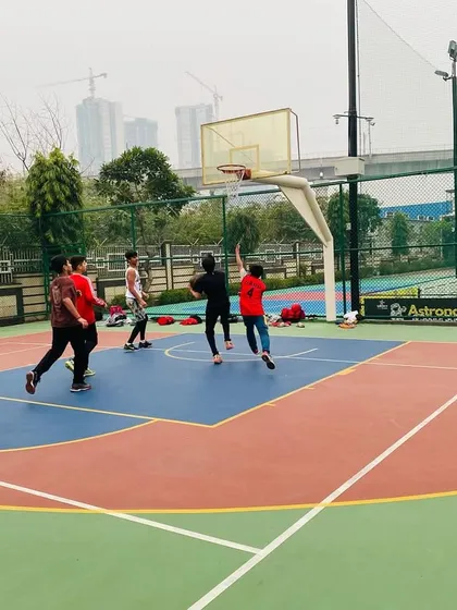 A player shoots a layup during practice.