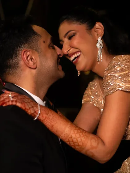 Pure, uninhibited laughter. This candid close-up is a perfect example of capturing the real, intimate moments of a wedding celebration.