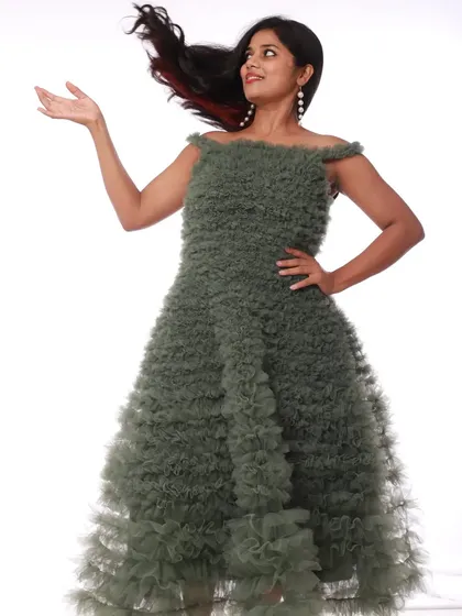 Have fun in this cute olive green frill outfit. The layers of ruffles create beautiful texture and movement, making it a joy to wear.
