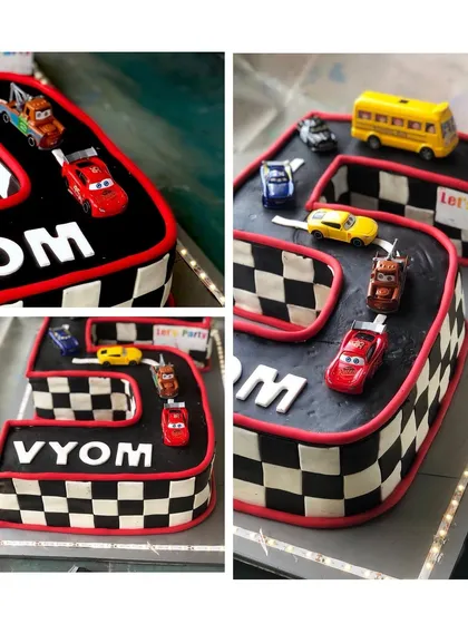 More angles of the impressive racing track cake, perfect for a car-loving child.