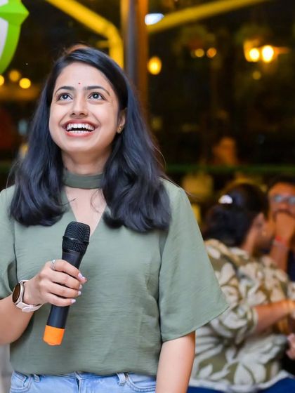 The pure joy of singing. This guest is having a fantastic time at one of my weekend gigs, completely lost in the music.